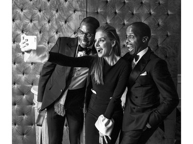 Left to right, Dexter Peart, Sarah Rafferty, and Byron Peart joke in the Canadian Arts & Fashion Awards studio during the Toronto gala, April 15, 2016.