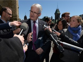 Minister of Transport Marc Garneau speaks to reporters on Parliament Hill in Ottawa on Thursday, April 28, 2019.