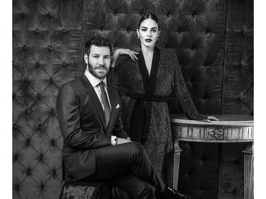 Former Montreal Canadiens Brandon Prust and partner  television host Maripier Morin  pose in the Canadian Arts & Fashion Awards studio during the Toronto gala, April 15, 2016.