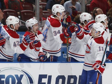 Brendan Gallagher of the Montreal Canadiens is congratulated by teammates after scoring a first period goal against the Florida Panthers at the BB&T Center on April 2, 2016, in Sunrise, Fla.