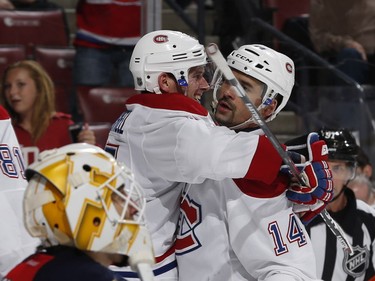 Torrey Mitchell, left, celebrates his goal with Tomas Plekanec of the Montreal Canadiens during second period action against the Florida Panthers at the BB&T Center on April 2, 2016, in Sunrise, Fla.