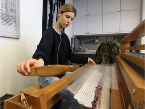 Lea Schwarz weaves conductive silver thread with transparent thread to create fabric to attach to circuits and connect to LED lights in the Textile and Materialty Research lab at Concordia University's Milieux Institute for Arts, Culture and Technology