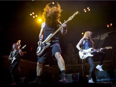 Dave Murray, left, Steve Harris and Janick Gers perform with Iron Maiden at the Bell Centre on Friday April 1, 2016, in Montreal.