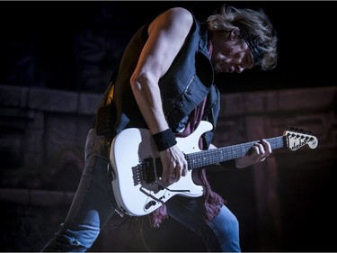 Adrian Smith performs with Iron Maiden at the Bell Centre on Friday April 1, 2016, in Montreal.