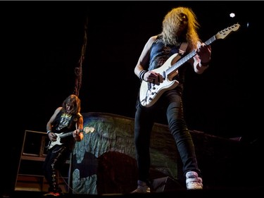 Dave Murray, left, and Janick Gers perform with Iron Maiden at the Bell Centre on Friday April 1, 2016, in Montreal.