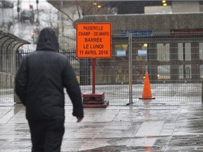 A pedestrian walks to the Champs-de-Mars metro station on Monday. The tunnel linking Old Montreal to the Champ-de-Mars metro station was closed on Monday, causing safety issues for pedestrians.