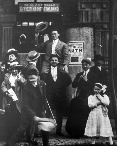 Young Jewish performers outside the Monument National theatre on St-Laurent Blvd., with poster for their play, Ruth, 1914. Source: Alex Dworkin Canadian Jewish Archives.