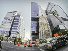 Construction work was halted at the CHUM hospital work site downtown Montreal after cracks were found on metal beams on the ninth-floor of a building structure.