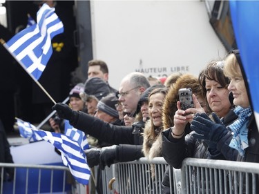 The crowd, gathered along the fences on Jean-Talon Blvd., braved the cold during the annual Greek independence Day parade on Sunday, April 3, 2016, in Montreal.