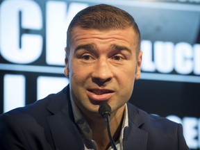 Former world champion Lucian Bute speaks to the media in Montreal, on Wednesday, April 6, 2016, about his coming world-title bout against Badou Jack on April 30  in Washington, D.C .