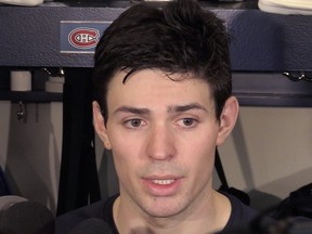 Goalie Carey Price of the Montreal Canadiens talks with reporters after practice at the Bell Sports Complex in Brossard near Montreal Wednesday, April 6, 2016. It was announced that Price, recovering from an injury, would not play in the season's remaining games.