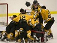 Lac St-Louis Lions celebrate their win over Les Cantonniers de Magog for the Ferrari Cup in Dollard des Ormeaux, Quebec April 8, 2016.