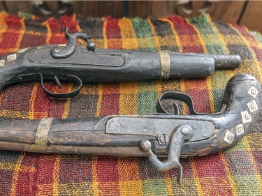 A pair of antique pistols from her native Iran in Mahin Shafei's N.D.G. apartment. (John Mahoney / MONTREAL GAZETTE)