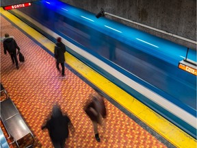 In this file photo, a train passes the Lionel-Groulx stop on Montreal's métro Green Line in Montreal, on Wednesday, February 24, 2016.