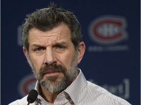 Canadiens GM Marc Bergevin listens to a journalist's question as he spoke to the media after team practice at the Bell Sports Complex in Brossard on Jan. 21, 2016. Bergevin gave coach Michel Therrien a vote of confidence after practice.