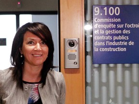 Nathalie Normandeau, former deputy premier of Quebec as a member of the Quebec Liberal Party leaves the Charbonneau Commission in Montreal, June 17, 2014 as her chief of staff between 2003 and 2011, Bruno Lortie was testifying.