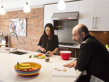 Micheline Filion and partner Claude Durand in the kitchen of their home in Montreal. (Pierre Obendrauf / MONTREAL GAZETTE)