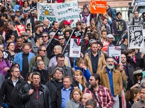 Hundreds of people took part in a May Day demonstration against the Quebec government's austerity measures in Montreal in 2015.