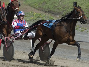 Yves Filion, driving Intimidate in Trois Rivières in 2013, will be inducted into the Canadian Horse Racing Hall of Fame in August.