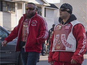 Nomads motorcycle club members Philippe Boudreau (left) and Martin Bernatchez leave the Alfred Dallaire Funeral Home in Repentigny as they walk to the church for the funeral service of 63-year-old Lionel Deschamps, a member of Hells Angels Montreal chapter, Saturday, November 7, 2015. Boudreau was shot in Lachute April 16, 2016.