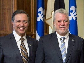 Quebec Premier Philippe Couillard and MNA Sam Hamad.