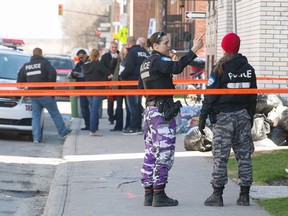 Montréal police at the scene of a police shooting at an apartment on Ontario Street near Sicard in Montreal, Monday  April 25 2016.