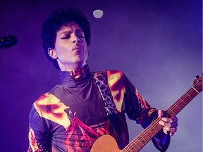Prince performing in concert in Chicago in 2012.