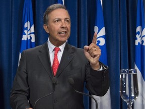 Quebec government MNA Sam Hamad tells reporters in April 2016 he will fight the accusations against him.