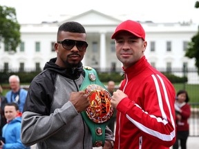 WBC champion Badou Jack, left, and Montreal's Lucian Bute pose for a portrait in front of the White House prior to their title fight, set for April 30, 2016 at the DC Armory, on April 27, 2016 in Washington, DC.