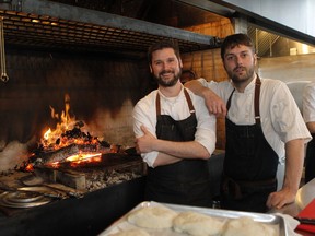Sommelier and maitre d' William Saulnier, left and chef Marc-André Jetté at Hoogan et Beaufort, where most of the cooking is done over an open fire.
