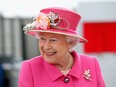 Queen Elizabeth II arrives at the Queen Elizabeth II delivery office in Windsor with Prince Philip, Duke of Edinburgh on April 20, 2016 in Windsor, England. The visit marks the 500th Anniversary of the Royal Mail delivery service. The Queen and Duke of Edinburgh are carrying out engagements in Windsor ahead of the Queen's 90th Birthday tommorow.