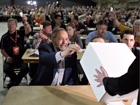 Federal NDP Leader Tom Mulcair casts his vote for the party leadership during the 2016 NDP Federal Convention in Edmonton Alta, on Sunday, April 10, 2016.