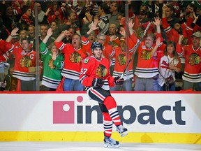 Chicago Blackhawks defenceman Trevor van Riemsdyk reacts after scoring to tie Game 6 in the second period during an NHL hockey first-round Stanley Cup playoff series against the St. Louis Blues, Saturday, April 23, 2016, in Chicago.