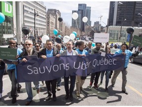 Uber drivers demonstrate against proposed legislation restricting their ride sharing service Friday, April 29, 2016 in Montreal.