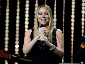 Mariah Carey performs at a March gala in Beverly Hills: The singer held a party where all the guests looked just like her.