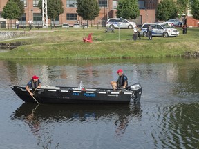 Police drag the Lachine Canal as they search for a man in his 30s who was reported missing Sunday, May 29, 2016.