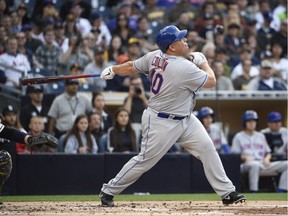 Bartolo Colon of the New York Mets hits a two-home run during the second inning of a baseball game against the San Diego Padres at PETCO Park on May 7, 2016, in San Diego.