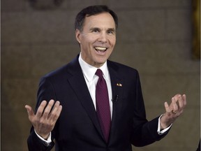 Minister of Finance Bill Morneau in the foyer of the House of Commons on Parliament Hill in Ottawa on Tuesday, March 22, 2016.