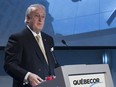 Quebecor Chairman of the Board Brian Mulroney speaks at the company's annual general meeting in Montreal, Thursday, May 12, 2016. Mulroney read a statement from an absent Pierre Karl Peladeau in which the former Parti Quebecois leader reiterated his confidence in the current management team.