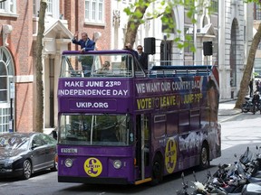 Leader of the United Kingdom Independence Party (UKIP), Nigel Farage arrives to launch the party's open-top bus that will be touring the UK for the campaign to leave the European Union, ahead of the referendum, in London on May 20, 2016. The referendum for whether Great Britain stays in or leaves the EU will take place on June 23. /