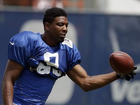 Indianapolis Colts' Duron Carter makes a catch during NFL football training camp Monday, Aug. 10, 2015, in Anderson, Ind. Carter is back in the CFL for a simple reason: To play football. The son of Pro Football Hall of Famer Cris Carter spent last season on the practice roster of the NFL's Indianapolis Colts. Carter says while he enjoyed his time in Indianapolis — and the challenge of facing Pro Bowl cornerback Vontae Davis daily — he rejoined the Alouettes to be more than a practice player.