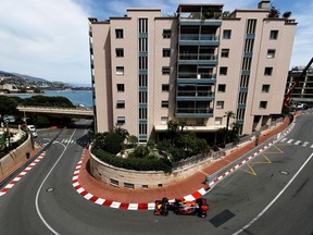 Max Verstappen steers his Red Bull around the streets of Monaco during practice.