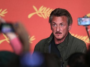 Sean Penn puts on his best face as The Last Face gets carved up at Cannes.