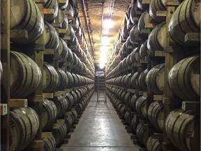 Bourbon and Tennessee whiskey get much of their signature flavour from extended aging in American oak barrels, such as these at the George Dickel distillery in Tennessee.