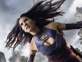 In this image released by Twentieth Century Fox, Psylocke, portrayed by Olivia Munn, appears in a scene from, "X-Men: Apocalypse." (Twentieth Century Fox via AP) ORG XMIT: NYET111