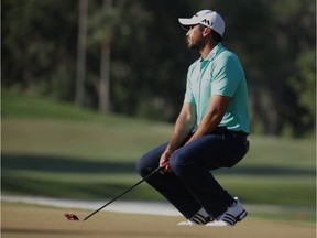 Jason Day of Australia reacts to a missed putt on the 14th green during the third round of The Players Championship golf tournament Saturday, May 14, 2016, in Ponte Vedra Beach, Fla. Day made par on the hole.