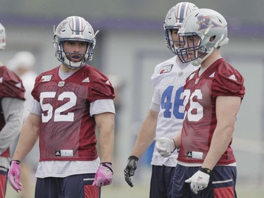 Player Nicolas Boulay, left, takes part in the Montreal Alouettes training camp at Bishop's University in Lennoxville on Sunday, May 29, 2016.