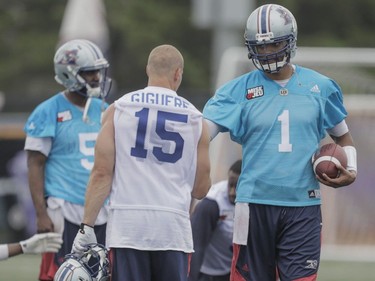 Quarterback Brandon Bridge, right, and player Samuel Giguère, left, take part in the Montreal Alouettes training camp at Bishop's University in Lennoxville on Sunday, May 29, 2016.