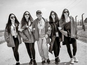 Marcel Zielinski takes part in the March of the Living with, from left, Erika Sebag, Noa Peretz, Joelle Sacksner and Emily Sarid Wednesday May 4, 2016 at the Auschwitz-Birkenau concentration camp in Poland.