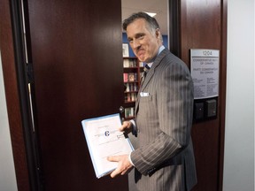 Conservative MP Maxime Bernier enters the offices of the Conservative Party of Canada as he officially launches his bid for the leadership of the party, on Thursday, April 7, 2016 in Ottawa.